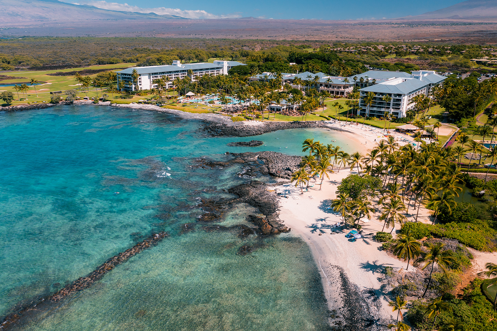 Aerial view of a white sand beach in Hawaii
