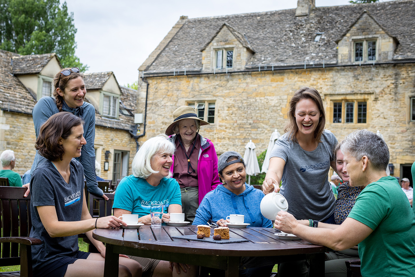 Eight Backroads guests enjoying English tea.