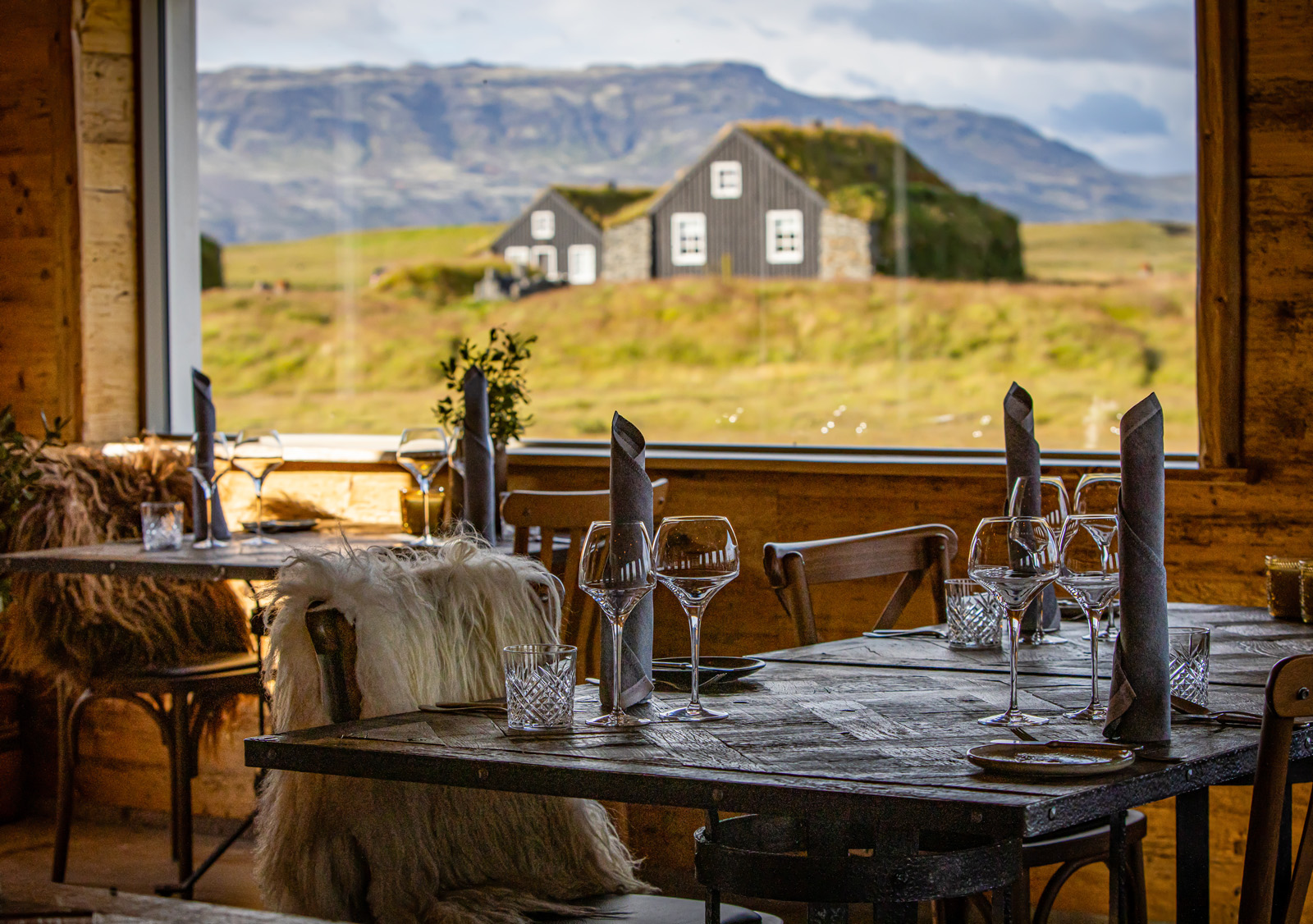 dining room with a view of a barn