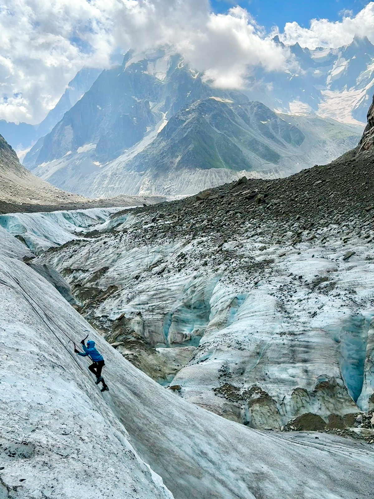 Person Climbing up an icy mountain
