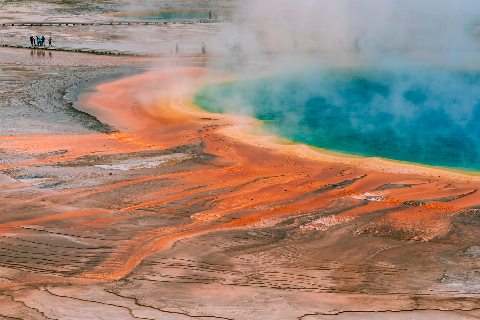 Large geyser with orange floor and blue water