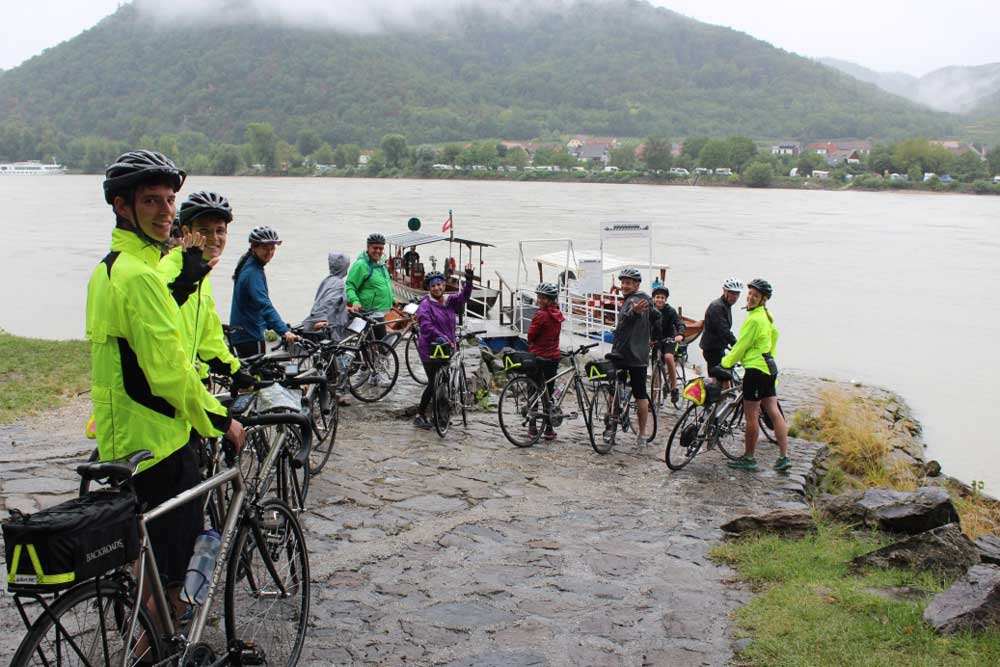 Backroads biking group about to ferry across the Danube