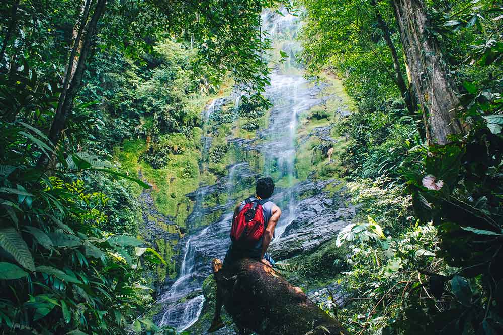 Backroads Hiker by Waterfall