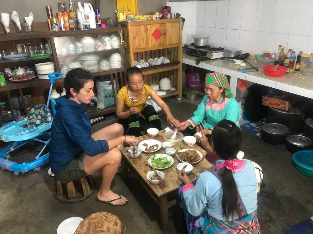 Eating dinner with locals in Sapa, Vietnam