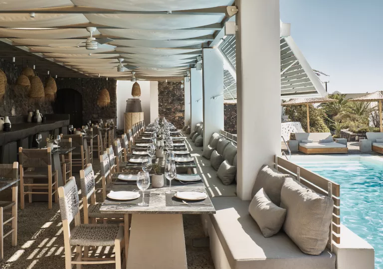 Dining area with an outdoor patio, leading to an outdoor pool