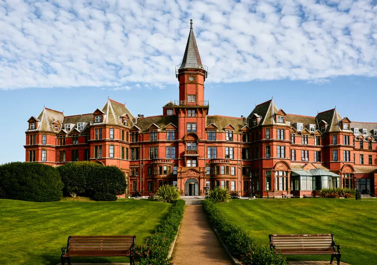 Outdoor wide shot of castle-like building