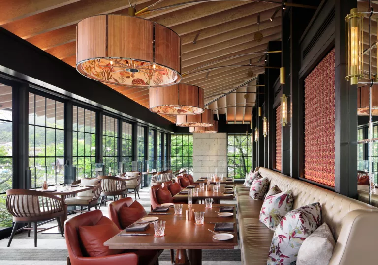 Hotel dining room with sloped wood ceilings
