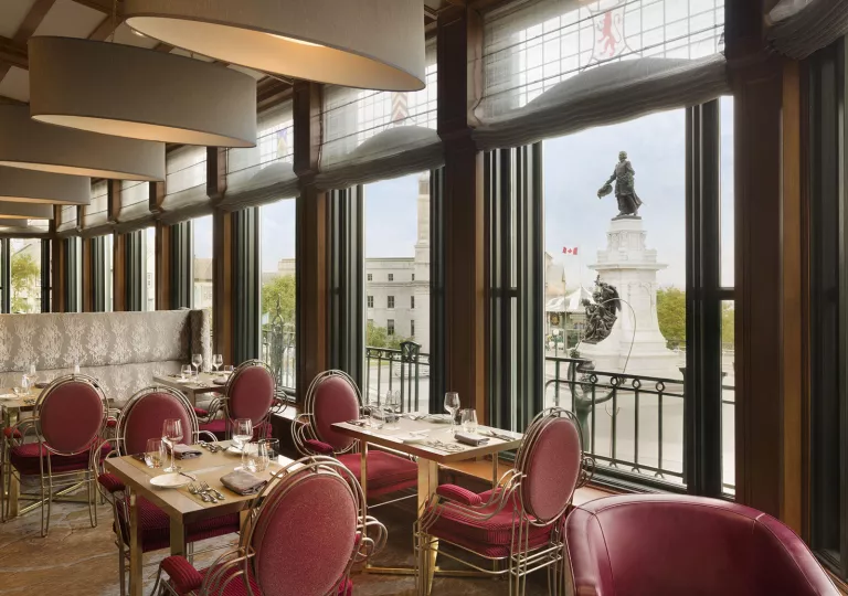 ornate dining room overlooking statue