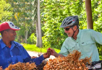 Tom Hale, Backroads Founder, meeting a Cuban Local