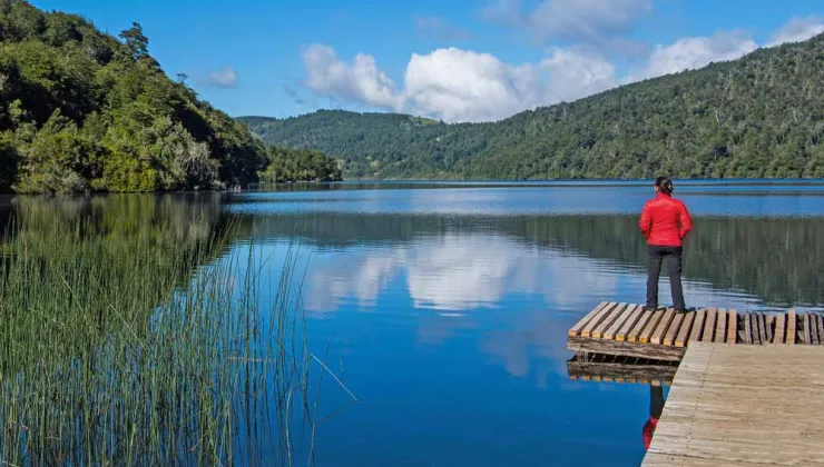 Backroads Hiker on Dock at lake in Chile