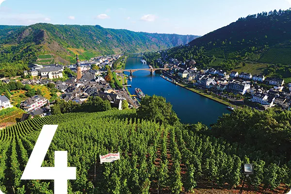 text:4; image: Aerial view of river surrounded by greenery