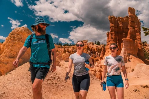 three hikers in canyon - up-close shot