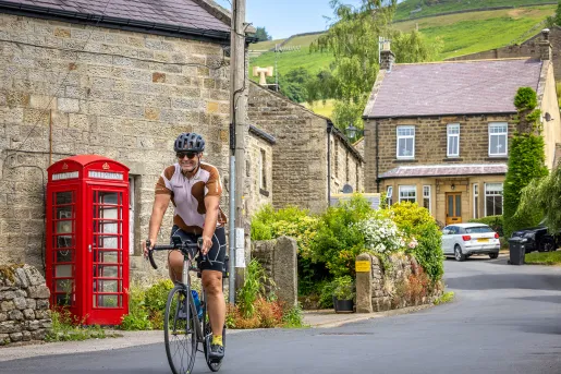Cyclist Red Telephone Booth Scotland