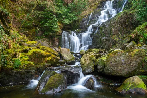 waterfall over mossy rocks