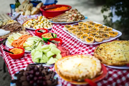 Lunch spread, fruit, veggies, quiche, kabobs, etc.