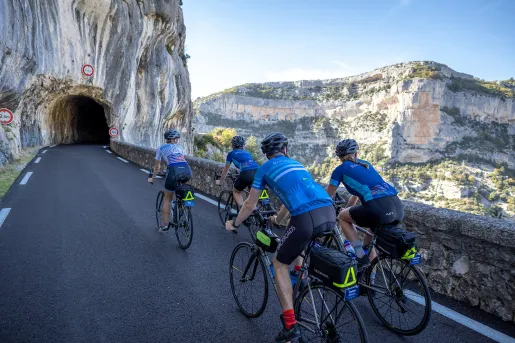 Backroads Guests Biking Towards Tunnel