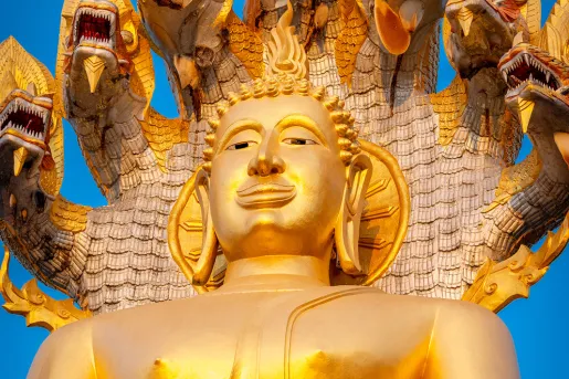 Golden shrine statue with a snake with 7 heads