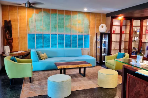 colorful hotel lobby with blue and green seating
