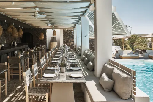 Dining area with an outdoor patio, leading to an outdoor pool