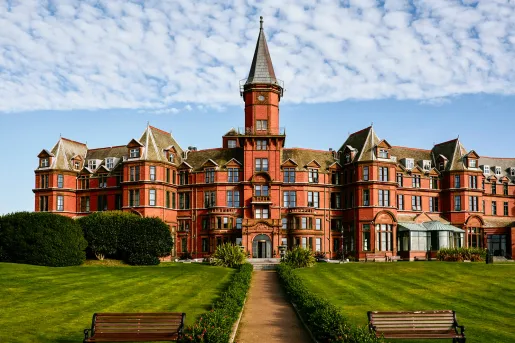 Outdoor wide shot of castle-like building