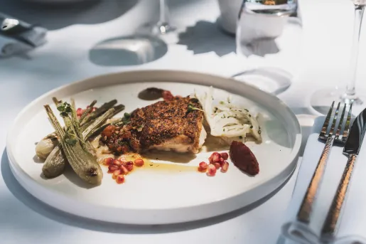 Plate with roasted chicken and vegetables