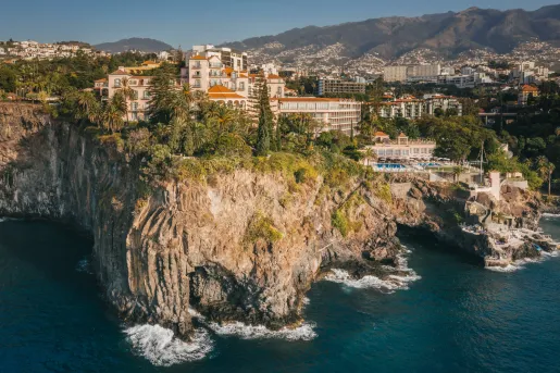 Large hotel building on an oceanside cliff