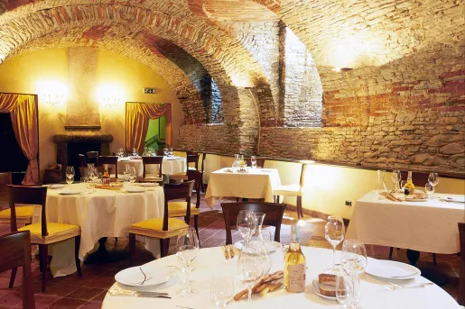 dining room with arched stone cielings