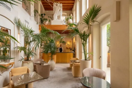 hotel lobby with palm fronds
