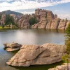 Rock formation and lagoon with trees