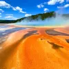 Orange sand leading up to smoking hot springs 