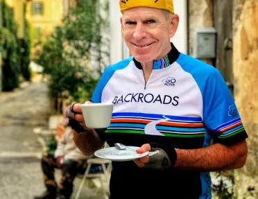 Backroads Guest Drinking Coffee 